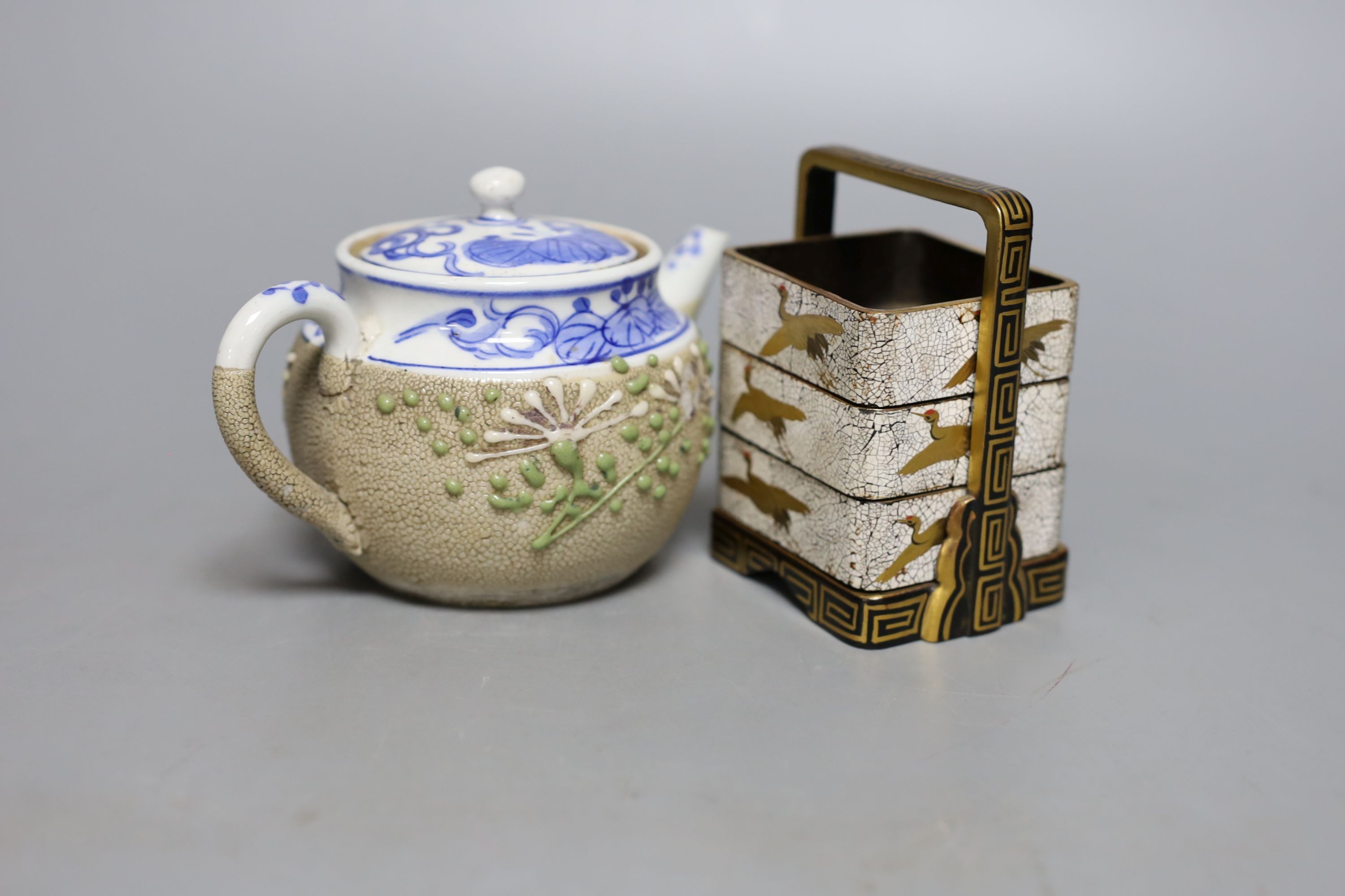 A group of Japanese lacquer and a blue and white teapot, 8cm. high